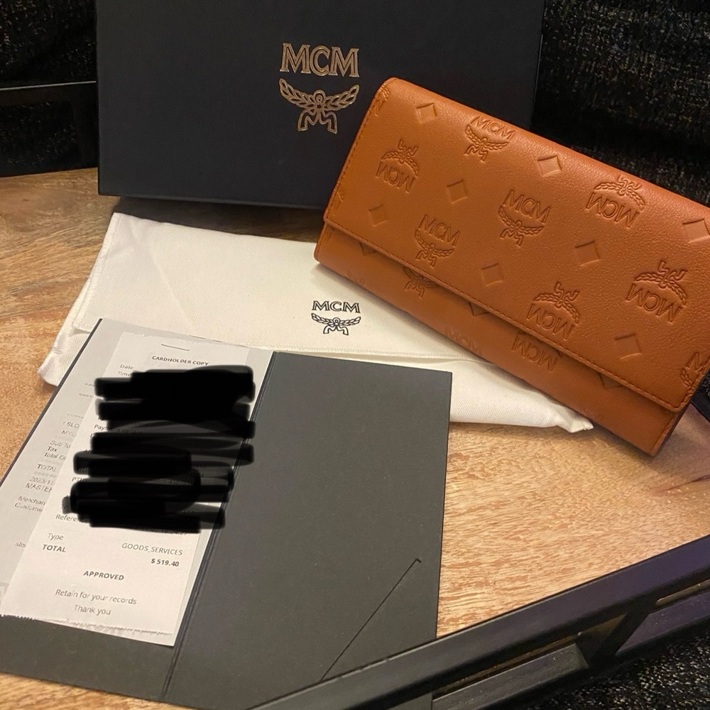 AREN CONTINENTAL WALLET IN EMBOSSED MONOGRAM LEATHER